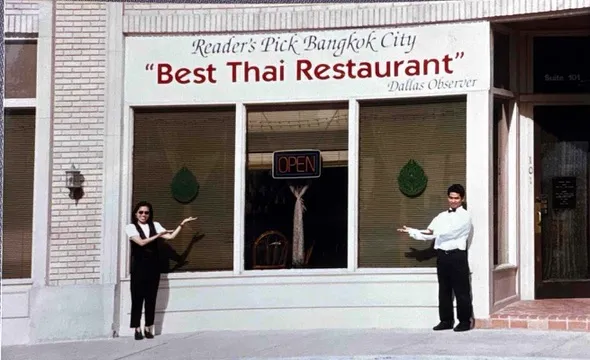 Jan and Ood standing outside Bangkok City Restaurant in 1996